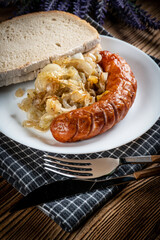 Fried sausage with onion.