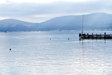 A small pier at Yamanaka lake in the morning.