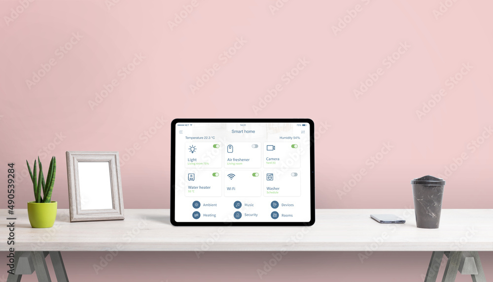Aufkleber Tablet with smart home app on home desk. Concept home automatization app with important home devices control