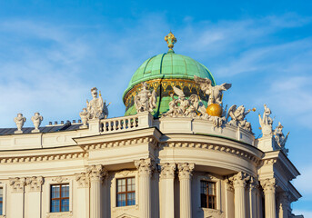 Fototapeta na wymiar Dome of Hofburg palace on St. Michael square (Michaelerplatz) in Vienna, Austria