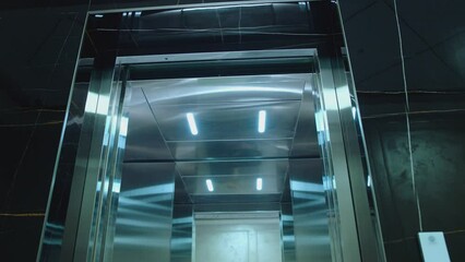 Cabin of modern passenger elevator. Digital lift scoreboard showing floor number. Digital display in the elevator which rises up on floor with an arrow up. Lift go up to the seventh floor. 7st to 1st 