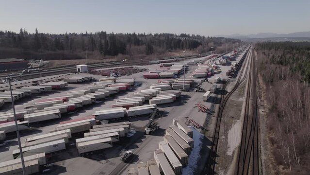 Reach stacker trolleys in logistic center of Vancouver in Canada. Aerial panoramic view