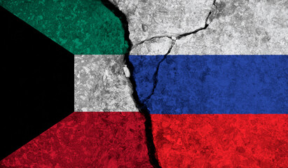 Political relationship between Kuwait and russia. National flags on cracked concrete background