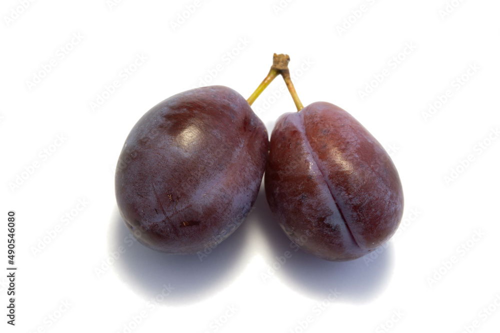 Wall mural plums isolated on white background