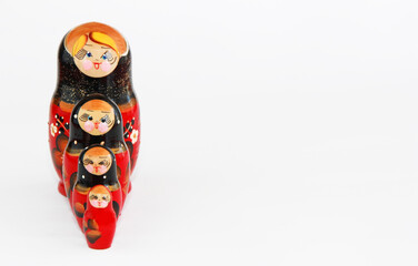 traditional russian doll matryoshka with floral pattern  on white background