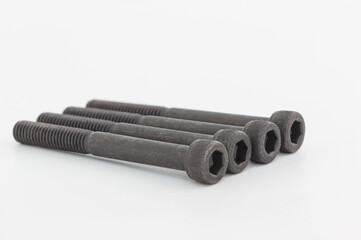Black screw, hex socket head, not threaded all the way.