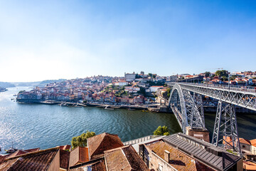 Fototapeta na wymiar View at the old center of Porto with the Dom Luís I Bridge over the river Douro, Portugal, Europe