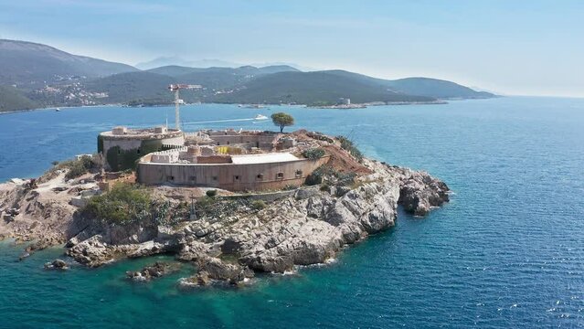 Montenegro. Island and fortress Mamula. Lastavitsa. Bay of Kotor, Adriatic Sea. Rebuilding the fortress into a hotel. Concentration camp during World War II. Drone shooting. Aerial view from a drone
