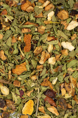 Relax herbal tea. Herbal tea prepared with lemon balm leaves, jasmine flower, apple peel, orange, lemon and hibiscus particles.