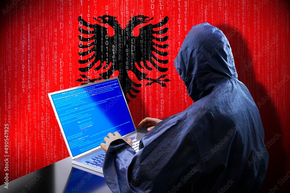 Poster anonymous hooded hacker, flag of albania, binary code - cyber attack concept