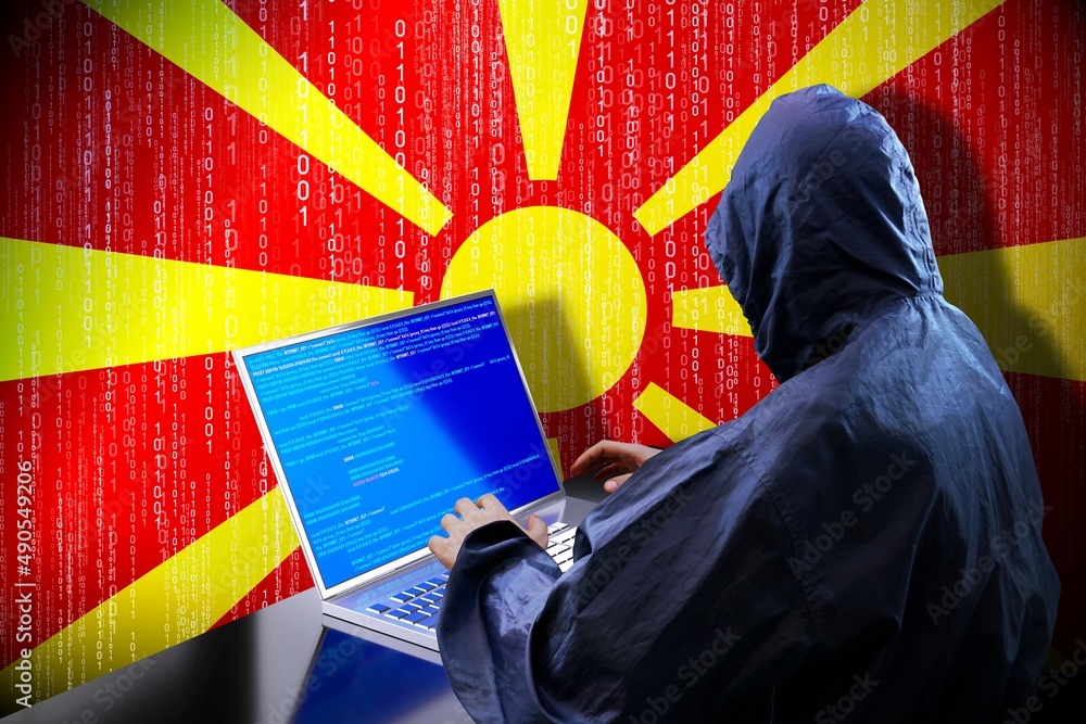 Poster anonymous hooded hacker, flag of macedonia, binary code - cyber attack concept