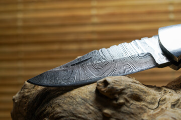 forged damast knife made of several layers of 