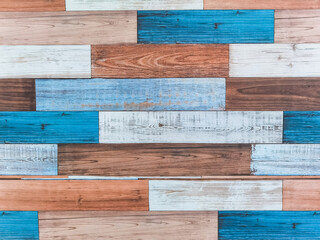 Wood planks, multicolor effective wood texture, Old wooden planks in multi-pastel colours with vintage style for background and texture. Beautiful wooden striped background painted with pastel paint.