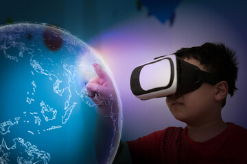 Obraz na płótnie Canvas kid child use vr video reality for enter cyberspace internet connect to metaverse