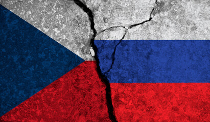 Political relationship between Czech Republic and russia. National flags on cracked concrete background