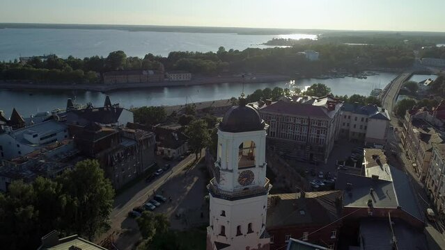 Aerial view of a medieval clock tower in heart of Vyborg old town. Panoramic cityscape
