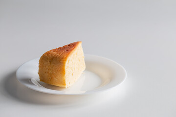 homemade pie on plate on white table