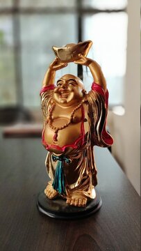 Laughing Buddha is also known as Fat Buddha. Budai (also known as Hotei or Pu-Tai) is a semi-historical Chinese monk who is venerated as a deity in Chinese Buddhism.