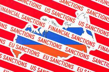 Map of Russia covered with lines with inscription Sanctions, Financial Sanctions on red background....