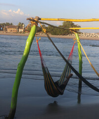 A man relaxing in a Hammock