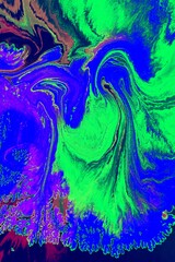 Blue-green marble background. Acrylic paint flows freely and creates an interesting pattern. Background for the cover of a laptop, laptop, book.