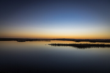 Sunset over Rye Harbour Nature Reserve, East Sussex, England
