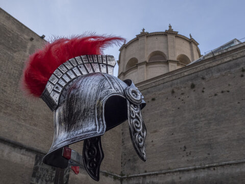 gladiator helm on rome background