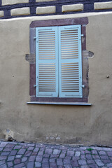 Obraz na płótnie Canvas old window with shutters