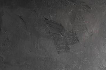 black abstract background. black concrete or cement wall with grunge texture