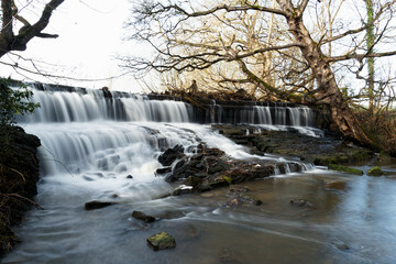 A waterfall on one of the lakes at Cannon Hall in Barnsley, South Yorkshire