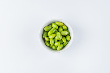 Green peas in a bowl. View from above. Flat lay