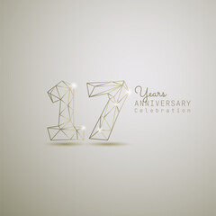 17 years anniversary logotype with gold wireframe low poly style. Vector Template Design Illustration.