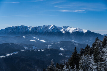 snow covered mountains, Bucegi Mountains, viewpoint from Postavaru Mountains, Romania 