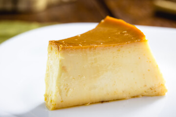 slice of dulce de leche pudding, dulce de leche pudding, typical Brazilian or French dessert