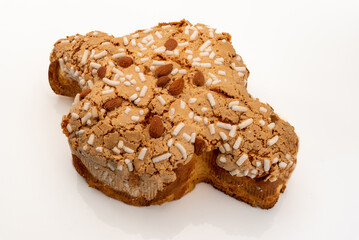 Colomba Pasquale, typical italian easter cake with sugar glaze and with almonds. Easter Dove in english. Isolated on white background