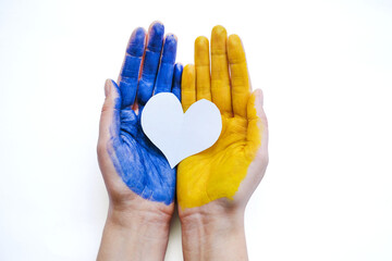 Stop War Ukraine. World peace. Hand hold flag of ukraine. 