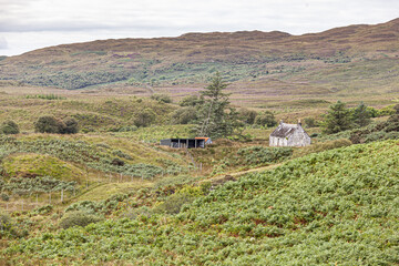 A lonely remote croft on the Sleat Penisula in the south of the Isle of Skye, Highland, Scotland UK - obrazy, fototapety, plakaty