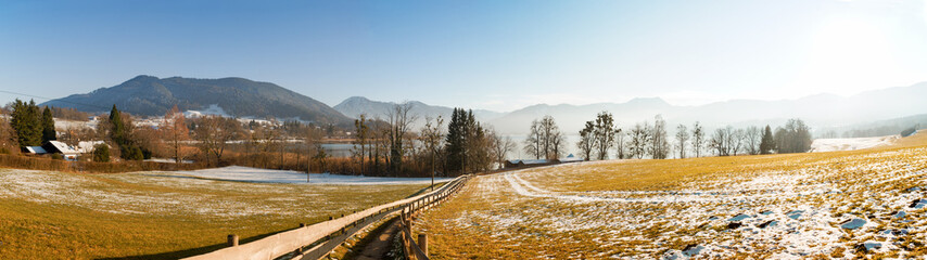 Fototapeta na wymiar footpath to lake Tegernsee, tourist resort Gmund, early spring season, wide panorama