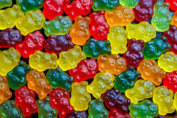 full-frame background and texture pattern of colorful jelly bears laid closely on flat surface