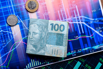 Brazilian money over a chart