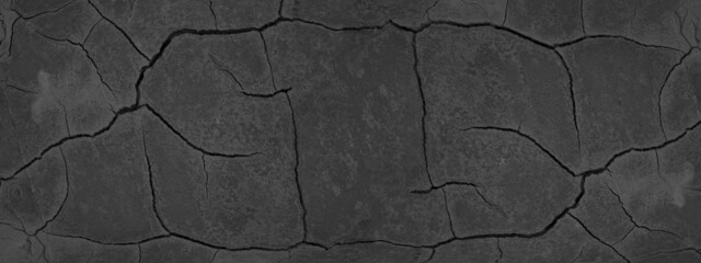 Old black anthracite gray grey damaged broken cracked concrete cement plaster stone wall texture...