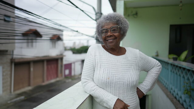 A Black Senior Woman Portrait Standing Outside Smiling At Camera