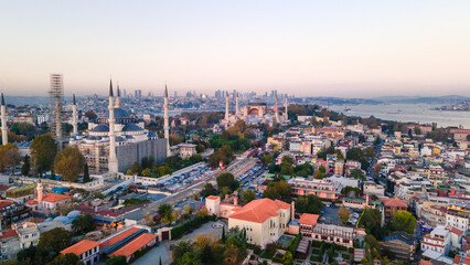Aerial view of Blue Mosque with six minarets in Istanbul, Turkey. Top view of tourist famous place Sultanahmet Camii in the old city center on sunrise
