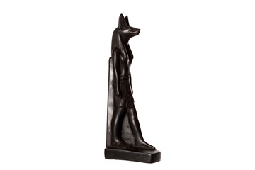 stone figurine of egyptian god Anubis with jackal head isolated on white background. side view
