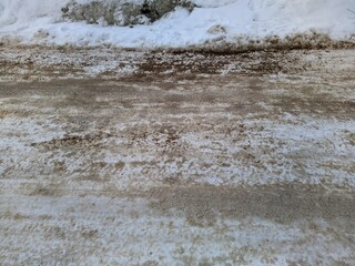 winter roads in Russia sprinkled with sandy sand so that cars do not slip.