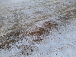 Obraz premium winter roads in Russia sprinkled with sandy sand so that cars do not slip.