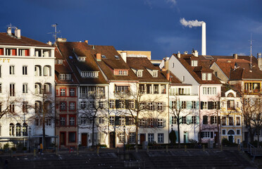 Old buildings on the riverside during sunset in Basel, Switzerland