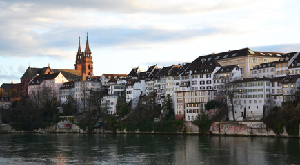 Obraz premium Old buildings on the riverside during sunset in Basel, Switzerland