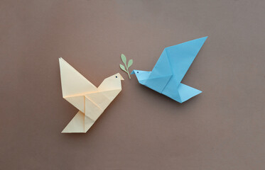 paper origami blue and yellow doves concept peace