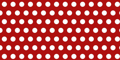white polka dot on red background